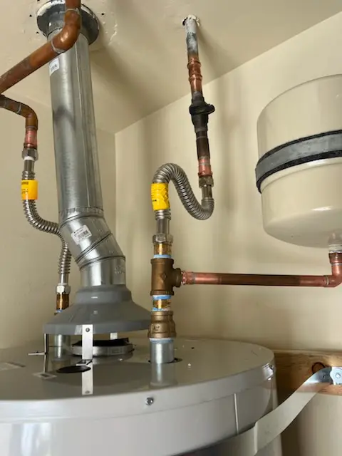 Water heater installation and plumbing repair in Pine Brook